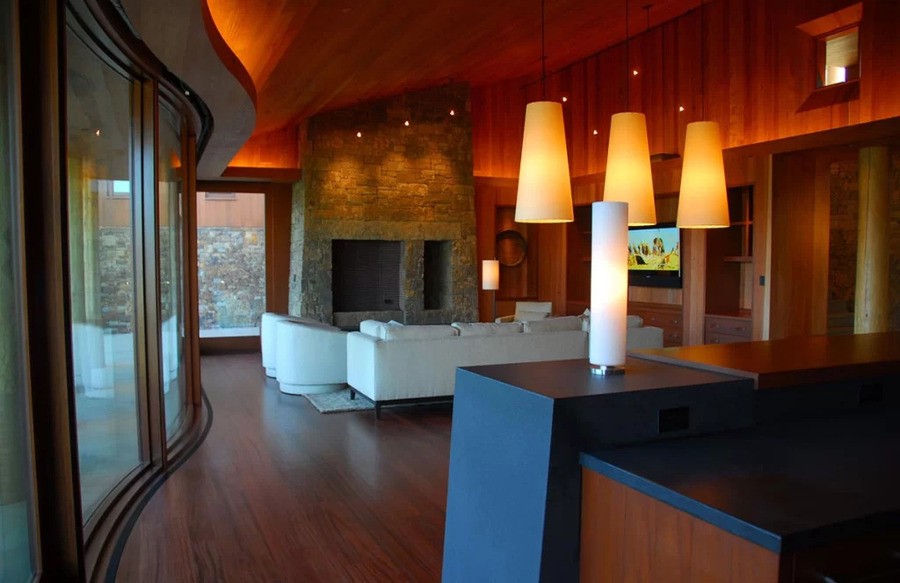A luxury living room with elegant pendant lights.